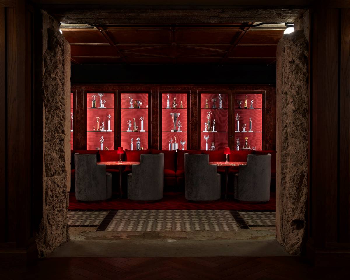 The Silver Lyan bar, highlighting the sophisticated design, ambient lighting and a display window with various prizes.