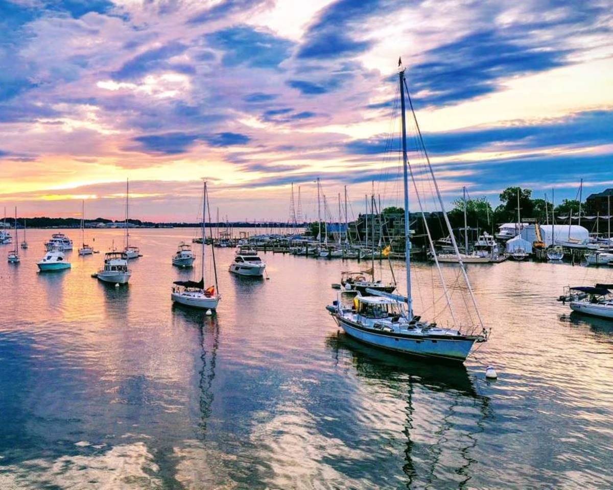 Annapolis, Maryland, showcasing its beautiful waterfront with boats harboured at sunset.