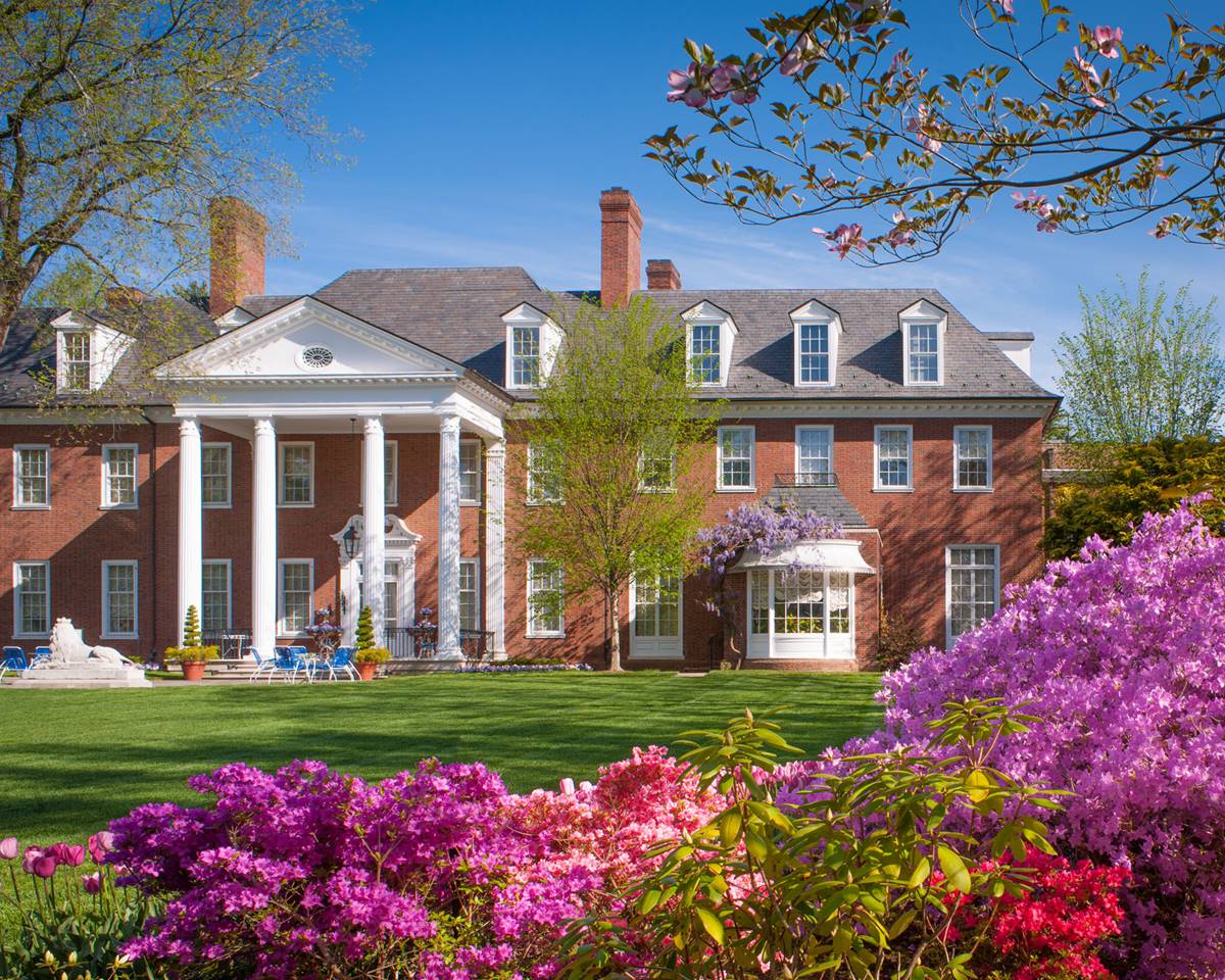 Hillwood Estate, Museum & Gardens, highlighting its beautiful architecture and lush gardens.